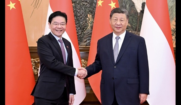 习近平会见新加坡总理黄循财