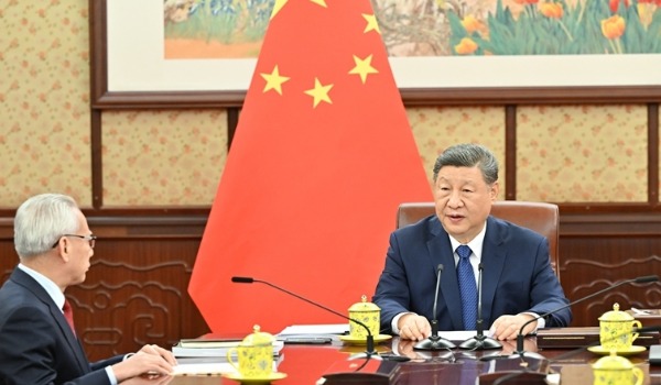 习近平听取岑浩辉述职报告