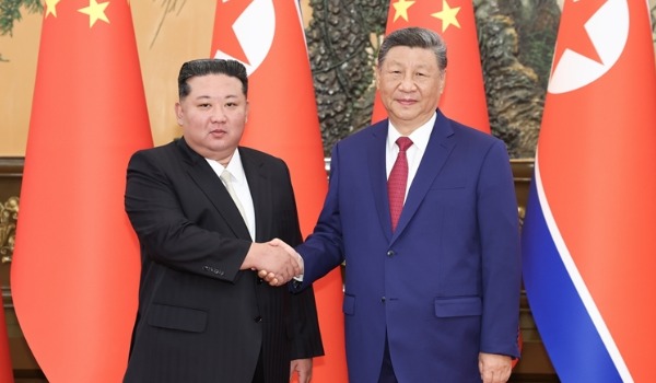 习近平同朝鲜劳动党总书记、国务委员长金正恩举行会谈